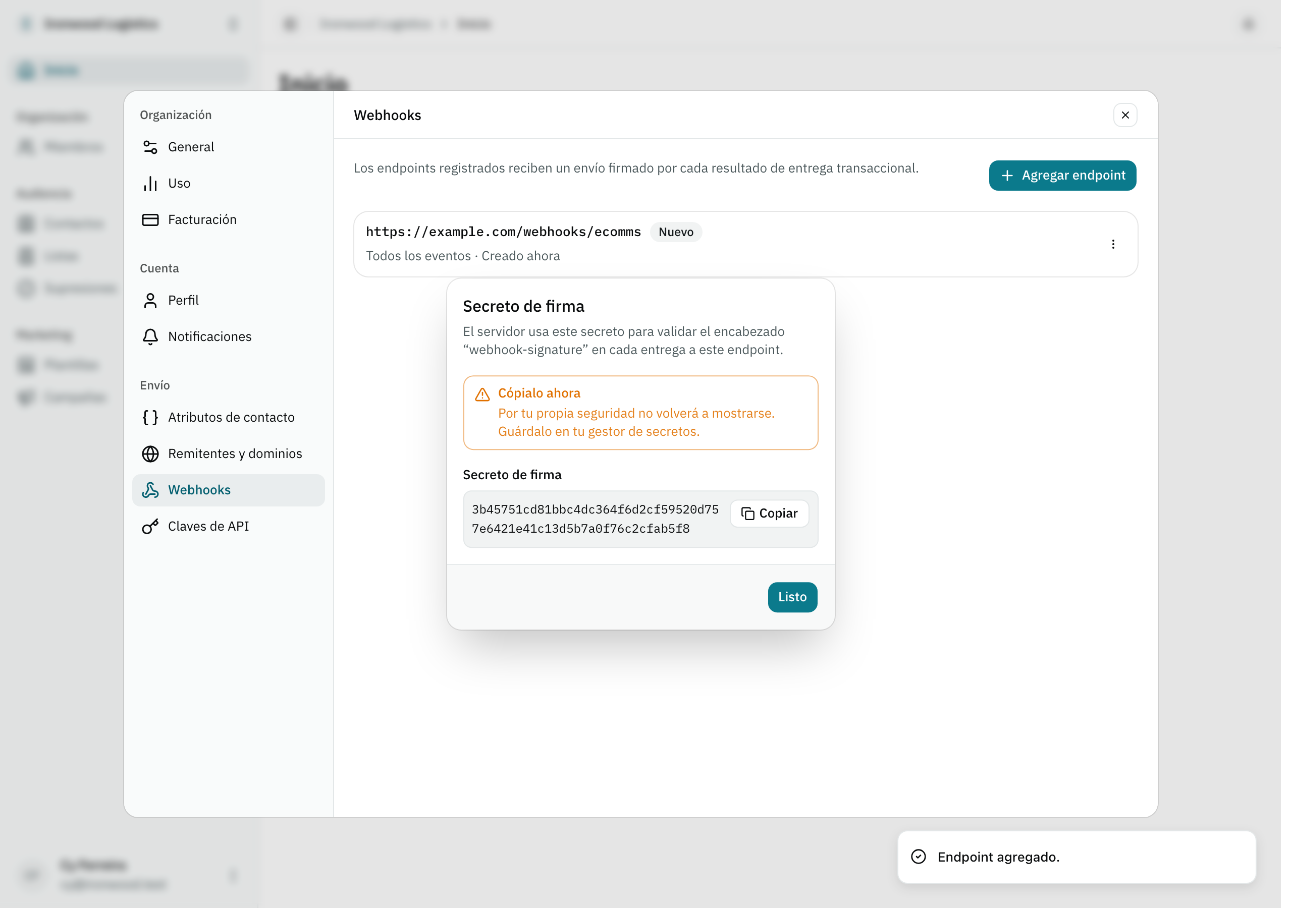 El diálogo que revela el secreto de firma de un endpoint de webhook recién registrado, con un botón para copiarlo.